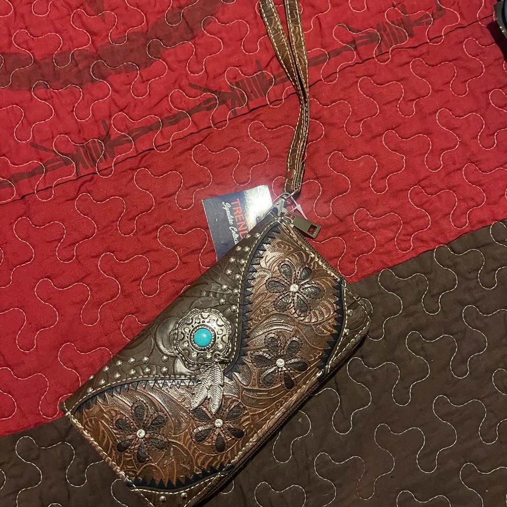 NuTrends Brown Embossed Wristlet with Turquoise Accent